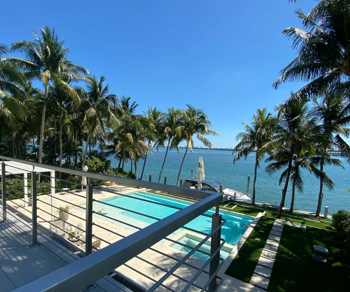 Cable railing over a pool facing Biscayne Bay